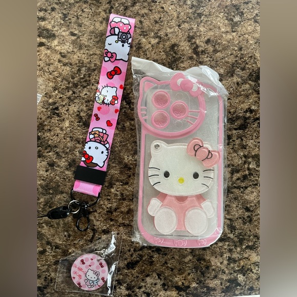 Hello Kitty iPhone 14 Pro phone case with wrist strap - Picture 1 of 2